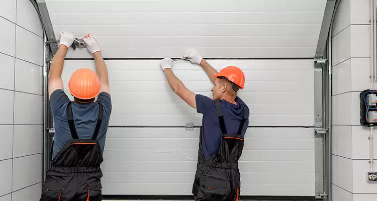 Garage Door Bottom Panel Repair in Dania Beach, FL